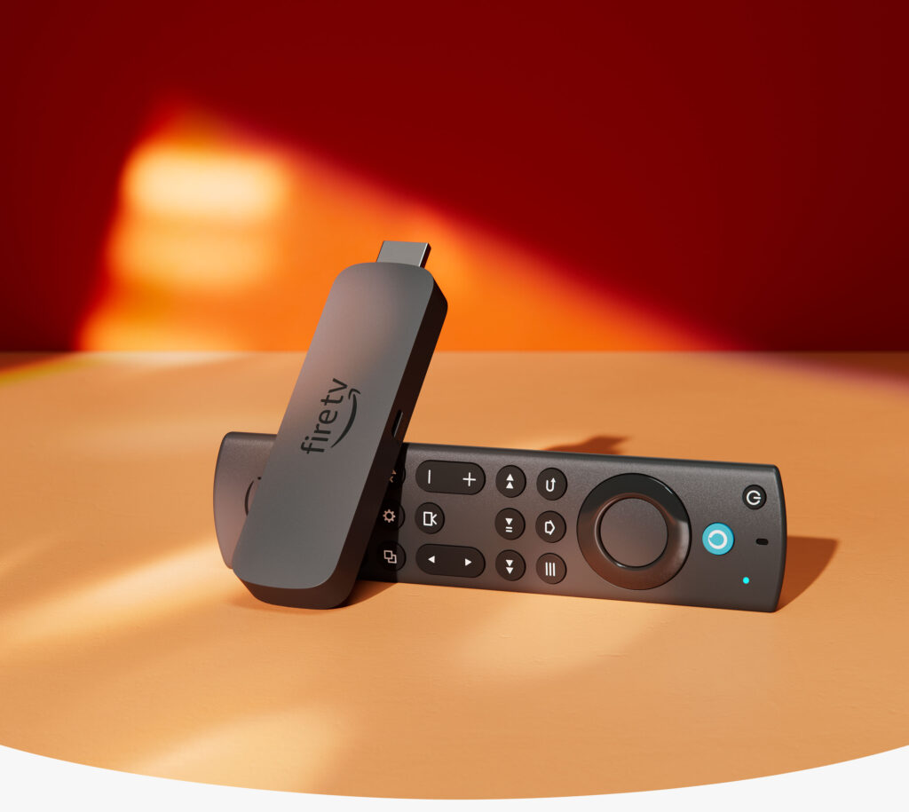 Dispositivo Fire TV Stick 4K Max y su mando a distancia con controles de navegación y botón de Alexa